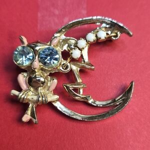 Vintage rhinestone owl, gold tone, with faux pearls sitting on the moon